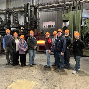 Photo of a group of casting and forging professionals at a foundry.